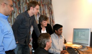 Tami Bakkar, Jono Townsend, owners Sue and Nick Hadley, with Gitesh Shah at the keyboard choose the winning number of a dinner for ten.